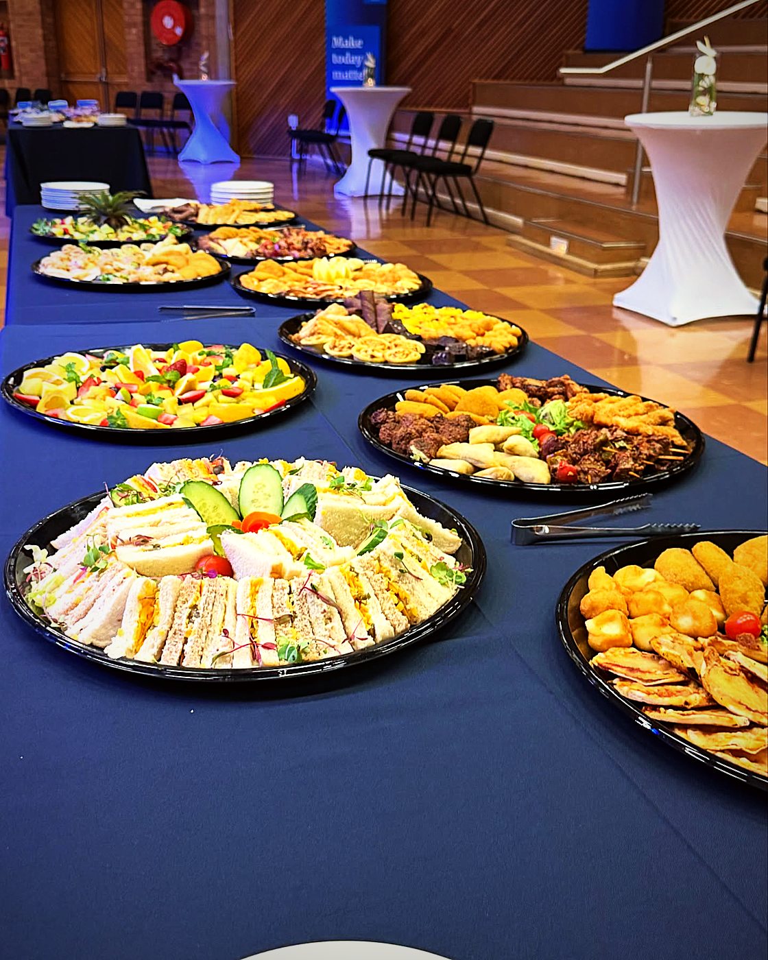 Sandwich, fruit and finger-food platters laid out at the GSTM Certificate Ceremony