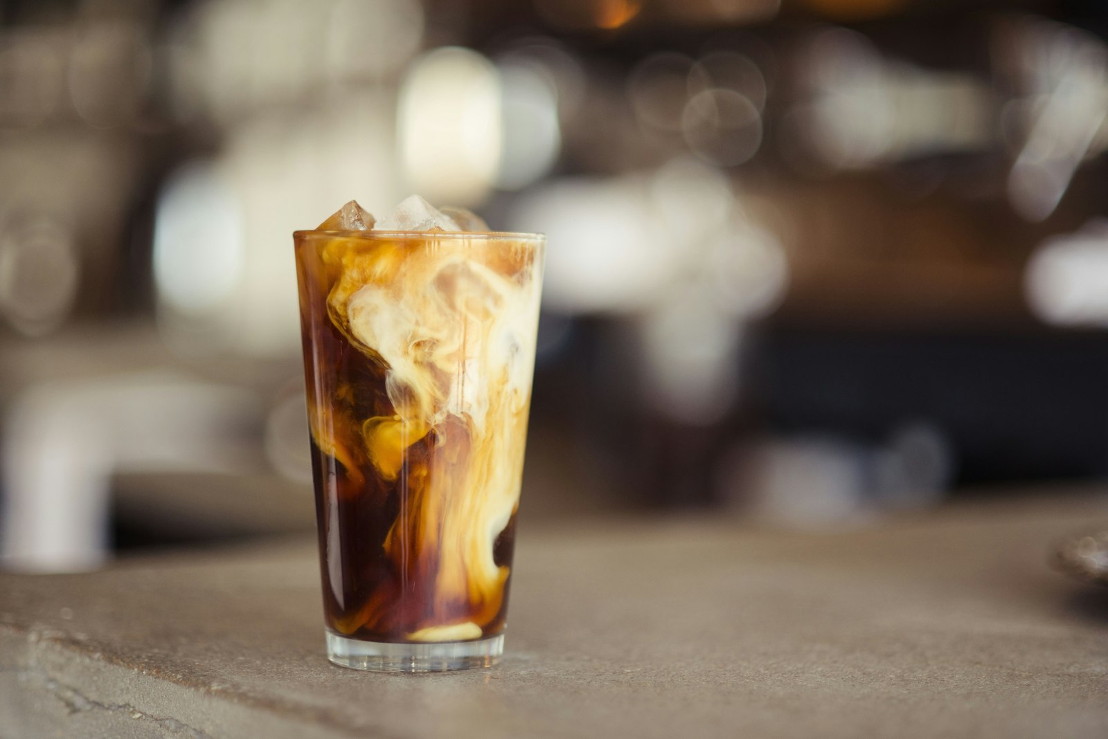 An iced latte in a glass
