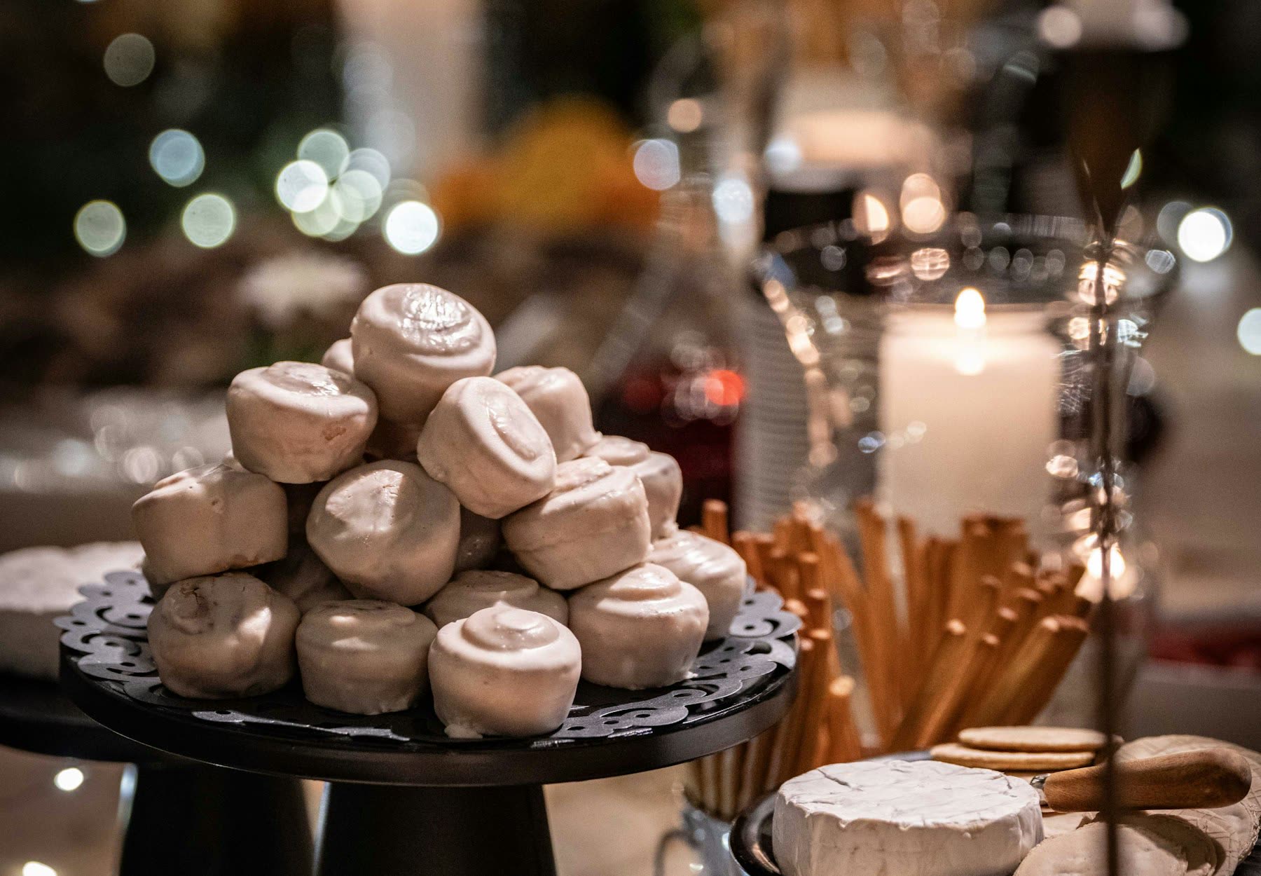 A candle-lit dessert and grazing table